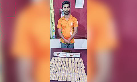 Peddler Naveen Kumar with seized pills
