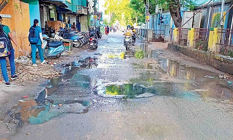 Overflowing sewage often splashes on the school kids when vehicles speed through the street 