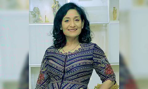 Dr Renuka David