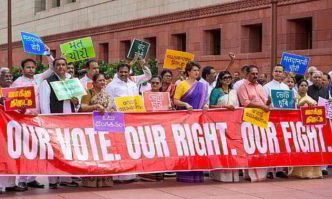 Congress MPs Priyanka Gandhi Vadra and Gaurav Gogoi, JMM MP Mahua Maji, Revolutionary Socialist Party MP N.K. Premachandran and other parliamentarians from the INDIA bloc parties at a protest against the Election Commission's Special Intensive Revision (SIR) of electoral rolls in Bihar, during the Monsoon session of Parliament, in New Delhi (PTI)