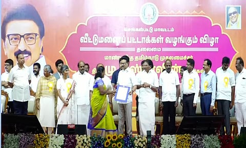 CM Stalin distributes housing plots to a beneficiary
