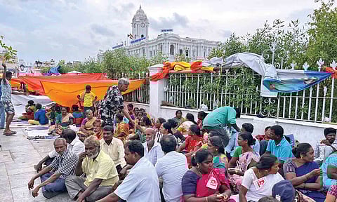 Cleanliness workers from the National Urban Livelihood Mission sitting in protest for the last 10 days outside Ripon Building