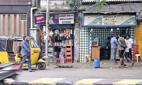 Two petty shops on Vepery High Road selling various tobacco products, including cigarettes
