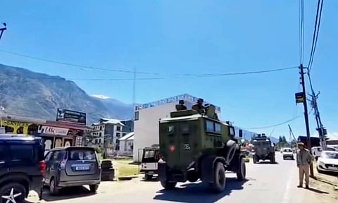 Security personnel patrol the area after an encounter broke out between terrorists and security forces in Kishtwar (PTI)
