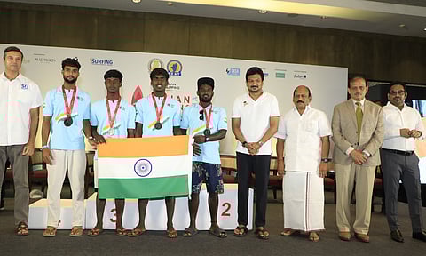 Surfers with Deputy CM Udhayanidhi Stalin, Arun Vasu, president of Surfing Federation of India, and other officials