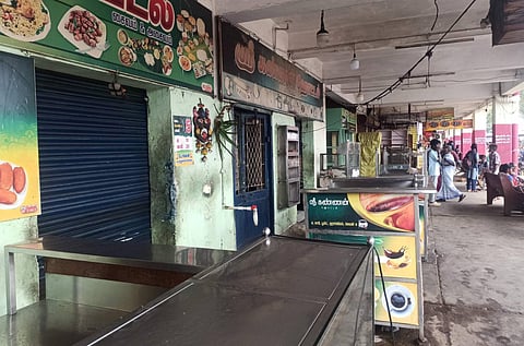 Shops closed in Palladam bus terminus in Tirupur 