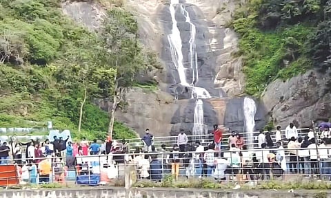 Tourists throng Silver Falls in Kodaikanal on Sunday 
