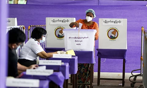 A voter casts ballot at a polling station on Nov. 8, 2020, in Yangon, Myanmar. (AP)