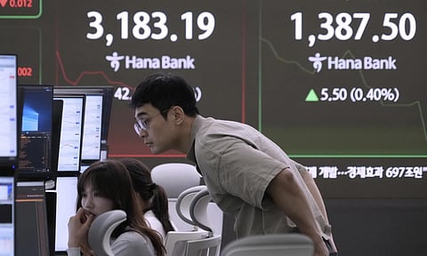 Asian shares retreat, tracking tech losses on Wall Street