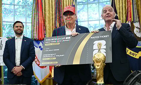 FIFA President Gianni Infantino presents Donald Trump with a final match ticket at the Oval Office