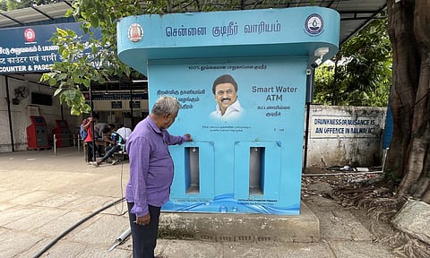 A commuter trying to use the water ATM kept on the EVR Periyar Salai entrance of the Egmore railway station