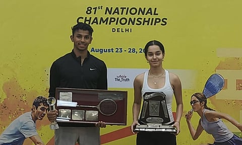 Velavan Senthilkumar and Anahat Singh with the trophies