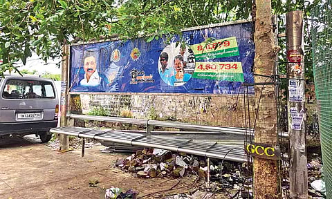 Dismantled bus shelter and debris of the demolished footpath lay haphazardly at the entrance of the bus terminus along Perambur High Road 
