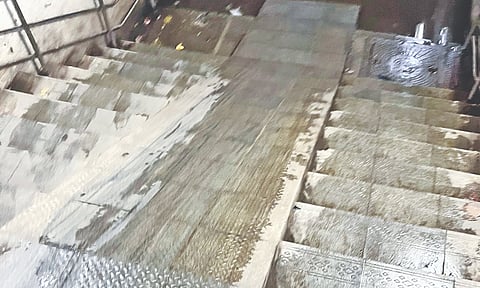 Stagnant water, slush and debris at the Jamalia pedestrian subway making it unusable