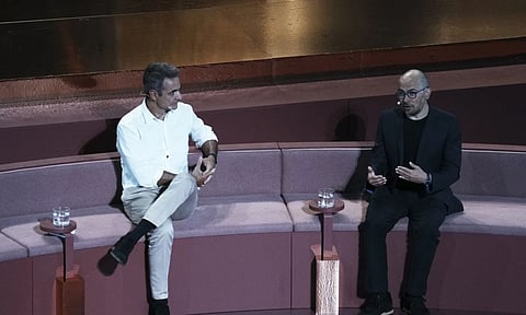 Demis Hassabis, CEO of Google's artificial intelligence research company DeepMind, right, and Greece's Prime Minister Kyriakos Mitsotakis discuss the future of Al, ethics and democracy during an event at the Odeon of Herodes Atticus (AP)