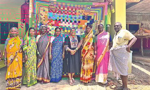 Anitha (black dress) with a few members of the Siddi community