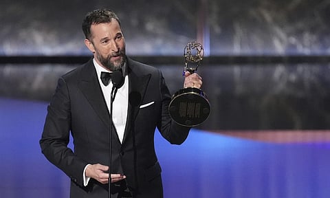 Noah Wyle accepts the award for outstanding lead actor in a drama series for “The Pitt” during the 77th Primetime Emmy Awards on Sunday, Sept. 14, 2025, at the Peacock Theater in Los Angeles. (AP Photo)