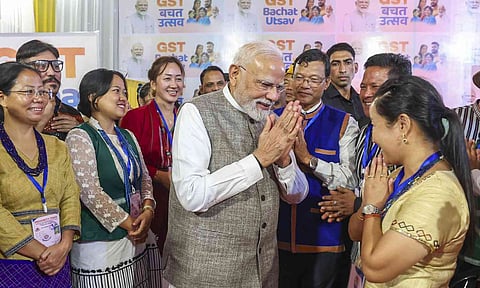 Prime Minister Narendra Modi interacts with local traders, merchants, and taxpayers during a 'GST Bachat Utsav' event in Itanagar, Arunachal Pradesh (PTI) 