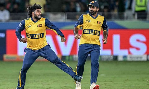 Sri Lanka’s Wanindu Hasaranga celebrates with Kusal Perera in the match against Bangladesh 