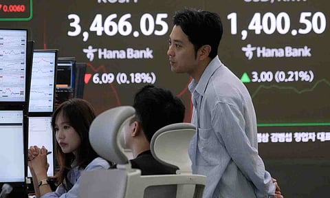 Asian shares tumble after Trump says he will impose new tariffs on drugs, other goods (AP) 