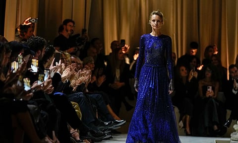 A model wears a creation as part of the Giorgio Armani Spring/Summer 2026 collection show in Milan, Italy (Image/AP)