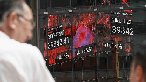 Asian shares surge as markets regain momentum