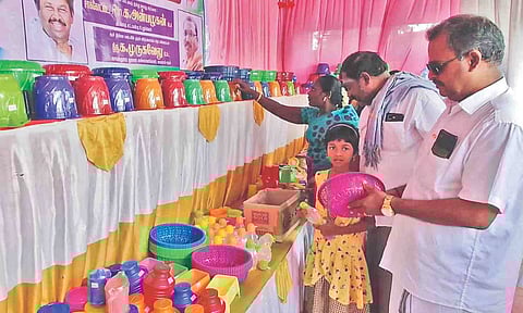 Customers selecting items in the honesty shop at Papanasam in Thanjavur on Thursday
