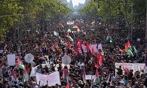 Pro-Palestinian demonstrators rally during a protest in Barcelona, Spain, Saturday, Oct. 4, 2025 in solidarity with the Global Sumud Flotilla after ships were intercepted by the Israeli navy (Image/AP)