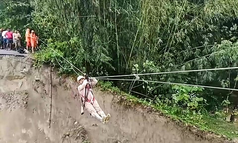 Rescue operation underway after landslides hit the area following heavy rainfall, in Darjeeling (PTI)