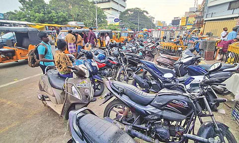 Two-wheelers parked along the NSC Bose Road on Sunday 