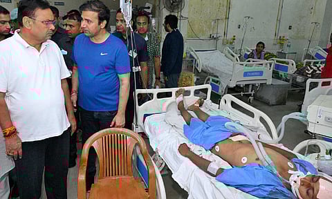  Rajasthan CM Bhajanlal Sharma meets an injured after a fire broke out at the trauma centre of the state-run Sawai Man Singh (SMS) Hospital, late Sunday night, in Jaipur (PTI)