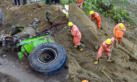 Damaged remains of a bus lie in debris after a massive landslide in Bilaspur (PTI)