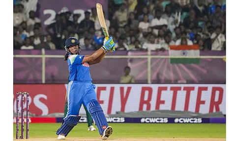 India's Richa Ghosh plays a shot during the ICC Women's World Cup ODI cricket match between India Women and South Africa Women, at the ACA-VDCA International Cricket Stadium, in Visakhapatnam, Thursday, Oct. 9 (PTI) 