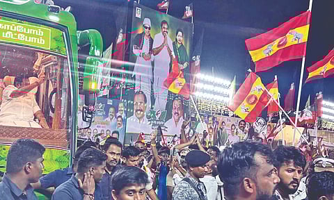 TVK flags mark their strong presence as AIADMK general secretary Edappadi Palaniswami waves at supporters in Namakkal