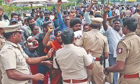 NULM cleanliness workers from Royapuram and Thiru Vi Ka Nagar zones being detained by the police on Friday