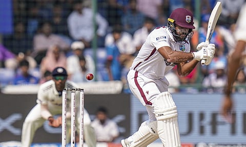  West Indies' John Campbell plays a shot on day two of the second and final Test cricket match of a series between India and West Indies, at the Arun Jaitley Stadium, in New Delhi, Saturday, Oct. 11, 2025. (PTI Photo/Shahbaz Khan)