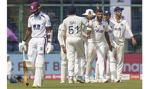 India's Jasprit bumrah celebrates the wicket of West Indies' Anderson Phillip with teammates during the fourth day of the second and final Test cricket match between India and West Indies at the Arun Jaitley Stadium in New Delhi, Monday, Oct. 13, 2025 (PTI) 