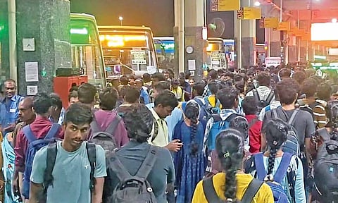 Crowd at the bus terminus being entertained by live musical performances on Saturday evening 