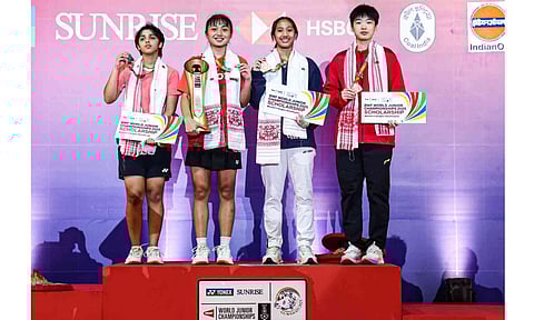 Tanvi Sharma atop the podium with fellow medallists 