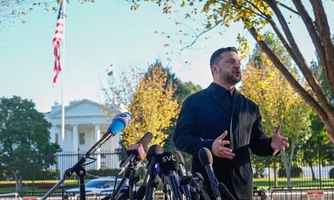 Ukraine's President Volodymyr Zelenskyy speaks to reporters in Lafayette Park across the street from the White House, following a meeting with President Donald Trump, Friday, Oct. 17, 2025, in Washington (AP)