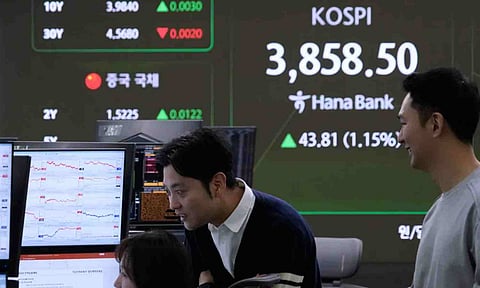 Asian shares slip on selling of tech stocks after lackluster day on Wall Street