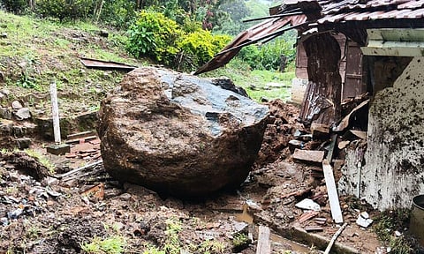 In Coonoor, a boulder rolled down the hillock from a height of 100 feet and crashed into a house