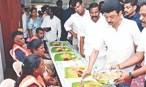 Chief Minister MK Stalin serving food to cleanliness workers (file photo)