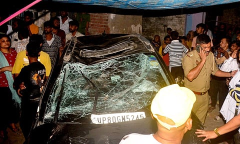 Police personnel and people gather at the site after a speeding car allegedly ran over pedestrians, killing five and injuring two, in Agra, Uttar Pradesh, Saturday, Oct. 25, 2025. (Photo: PTI)