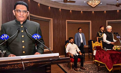  Telangana Governor Jishnu Dev Verma congratulates Congress leader and former cricketer Mohammad Azharuddin after the latter took oath as a state minister during a swearing-in ceremony, at Raj Bhavan, in Hyderabad. Chief Minister A Revanth Reddy is also seen (PTI) 