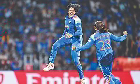Shafali Verma celebrates with Harmanpreet after a wicket