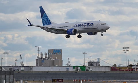 A plane lands at Newark International Airport in Newark, N.J. (Photo: AP)