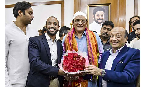 Former cricketer Mohammad Azharuddin is being felicitated as he takes charge as Minister for Minorities Welfare of Telangana, at Dr. B.R. Ambedkar Telangana State Secretariat, in Hyderabad, Monday (PTI) 