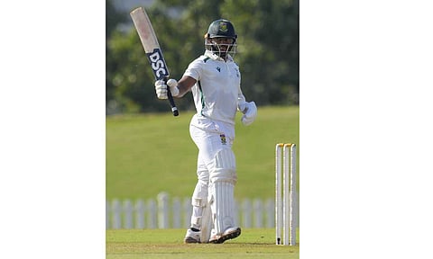 Temba Bavuma celebrates after his half-century against India A 