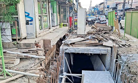 Construction of storm water drain has reduced the road width leading to traffic congestion during peak hours 